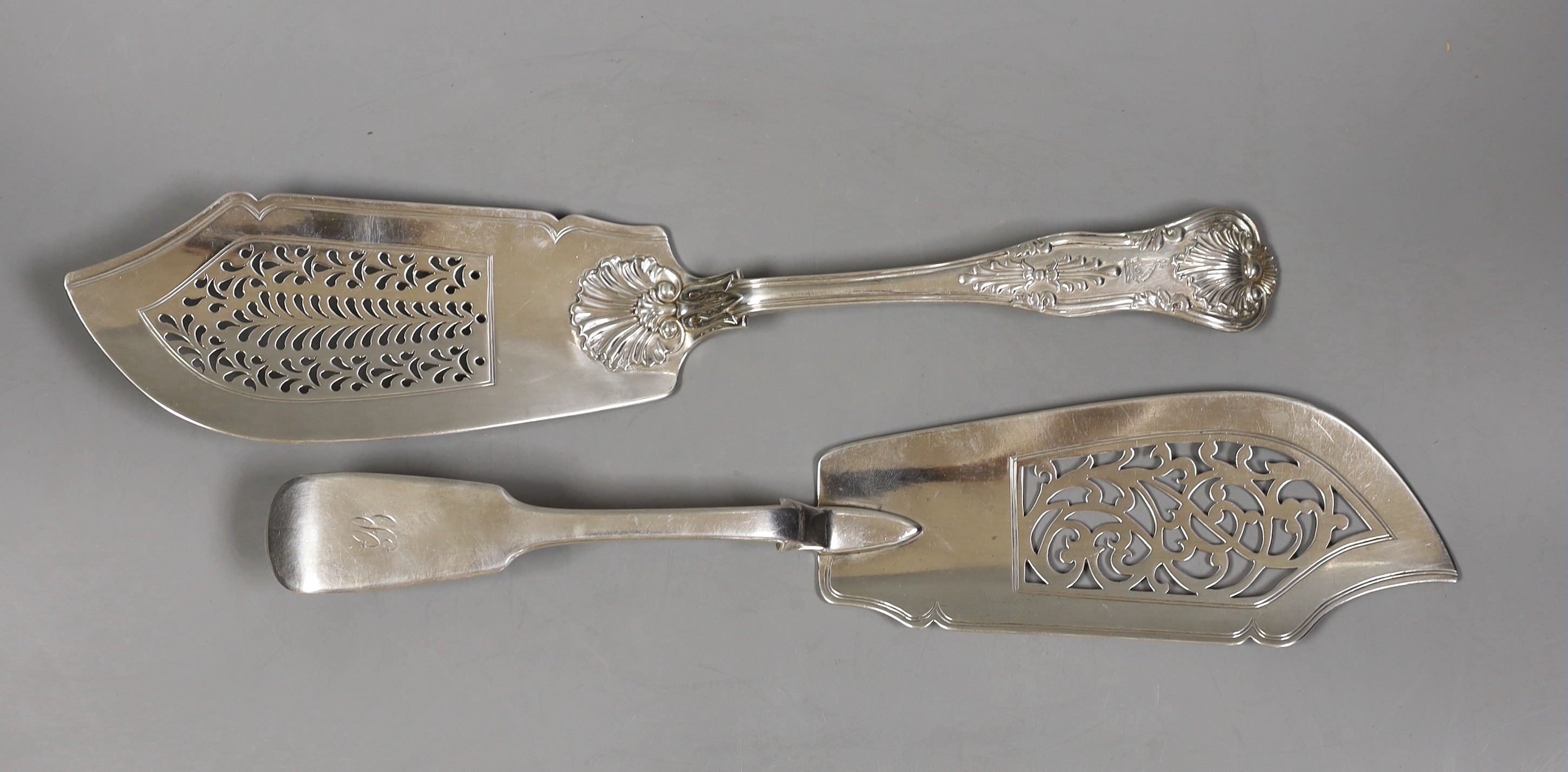 Two 19th century silver fish slices, Kings pattern by William Bateman, London, 1833, 32.1cm and fiddle pattern, William Eaton, London 1844